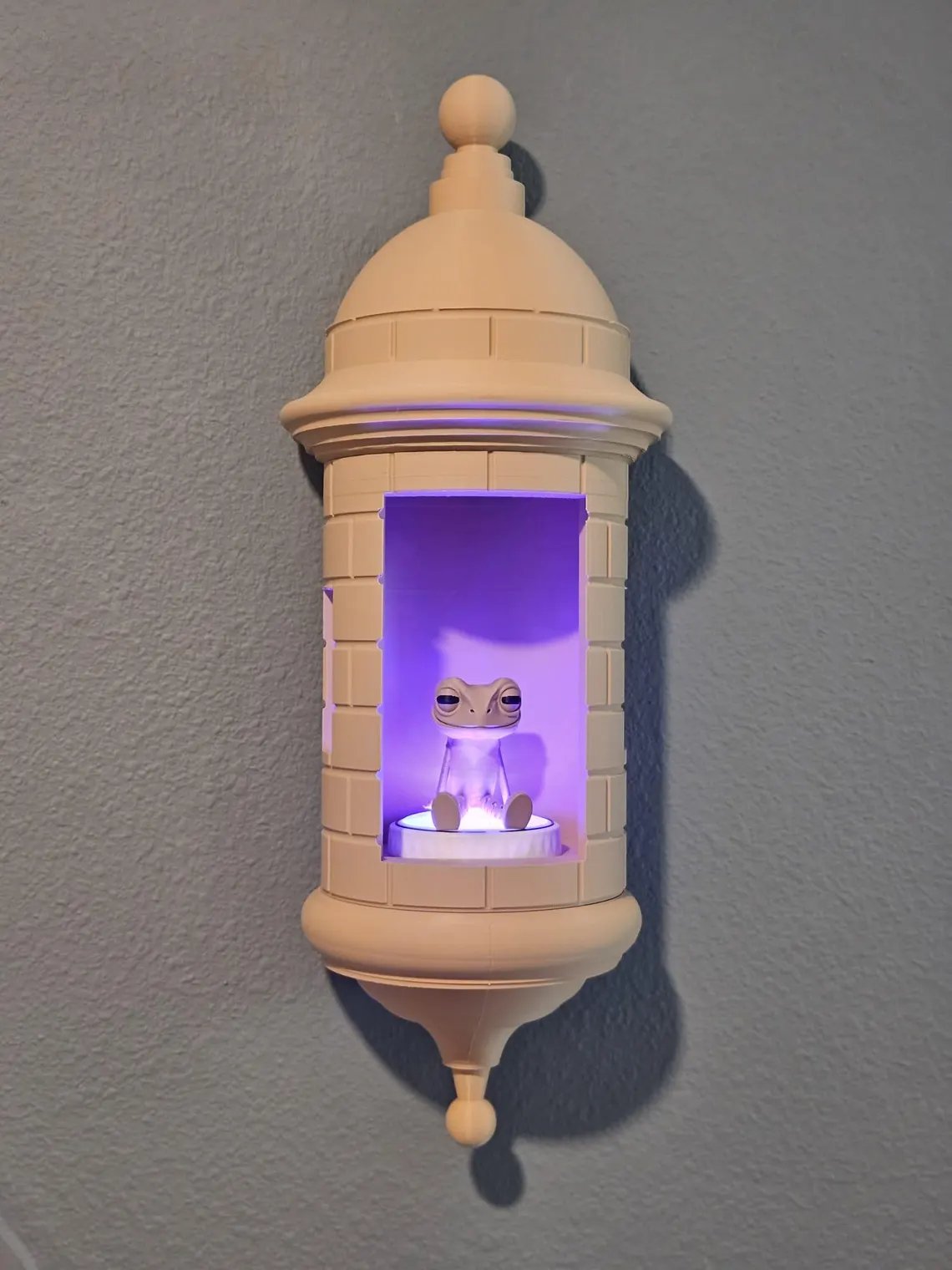 Lampada Coqui con parete Garita portoricana