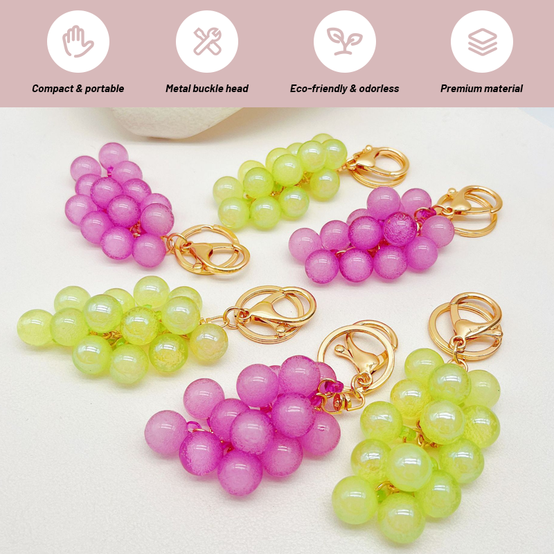 🍇Graziosi accessori regalo creativi a forma di ciondolo per borse