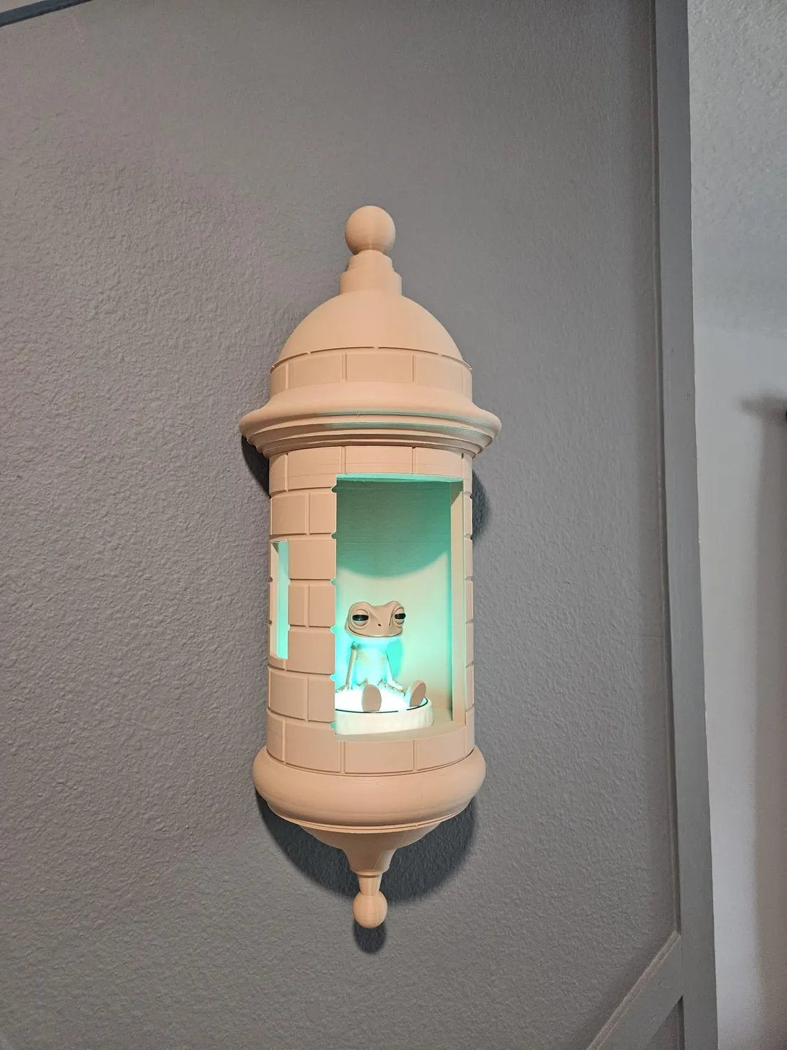 Lampada Coqui con parete Garita portoricana