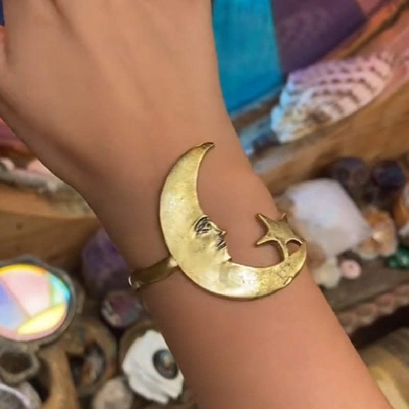 Bracciale aperto con motivo a stella e luna