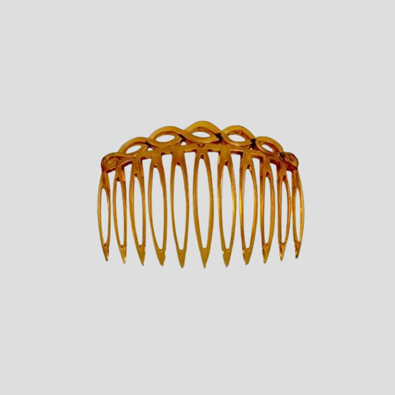 Pettinatura retrò per capelli intrecciati