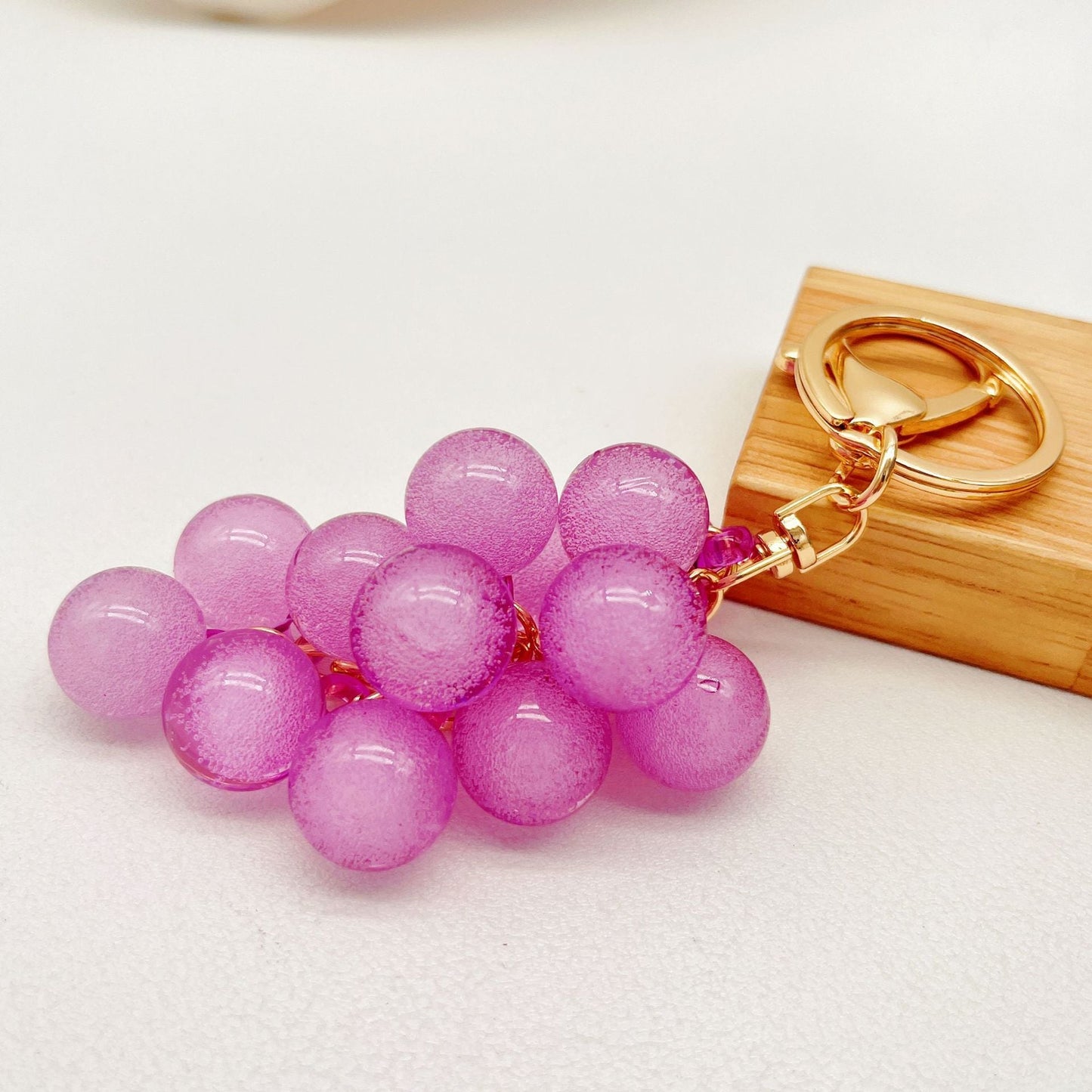 🍇Graziosi accessori regalo creativi a forma di ciondolo per borse