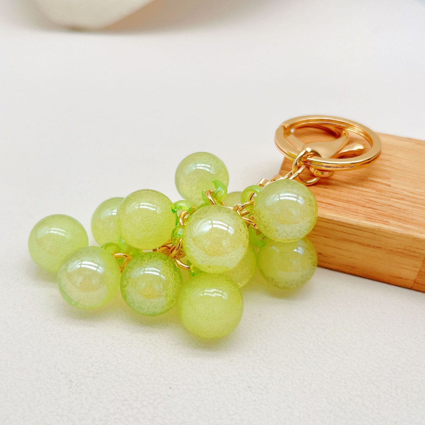 🍇Graziosi accessori regalo creativi a forma di ciondolo per borse