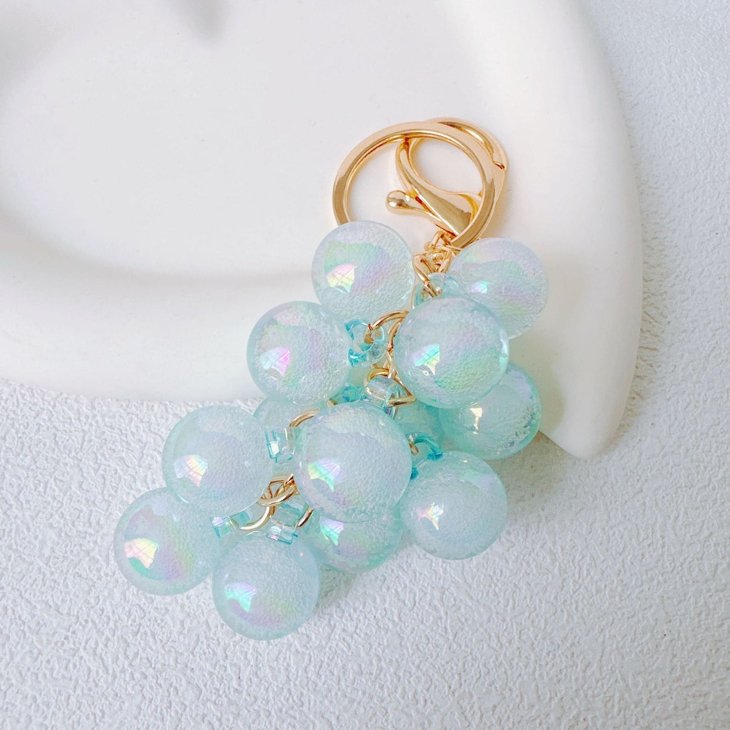 🍇Graziosi accessori regalo creativi a forma di ciondolo per borse