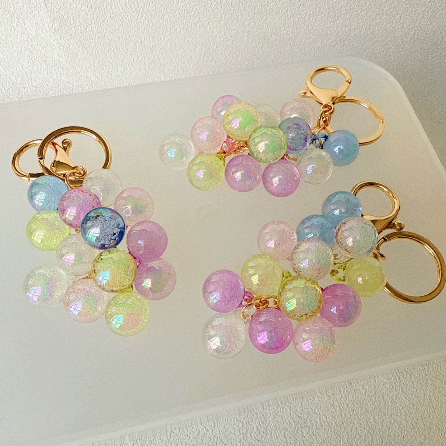 🍇Graziosi accessori regalo creativi a forma di ciondolo per borse