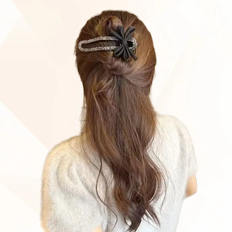 Elegante fermaglio per capelli nero con fiocco scintillante
