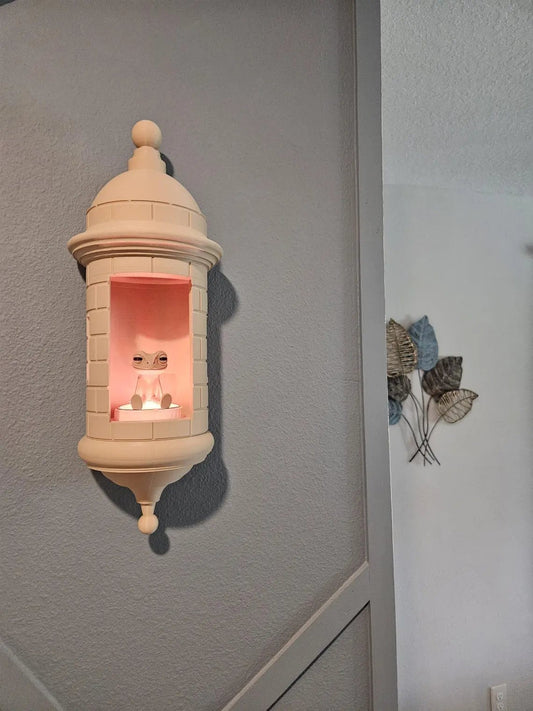 Lampada Coqui con parete Garita portoricana